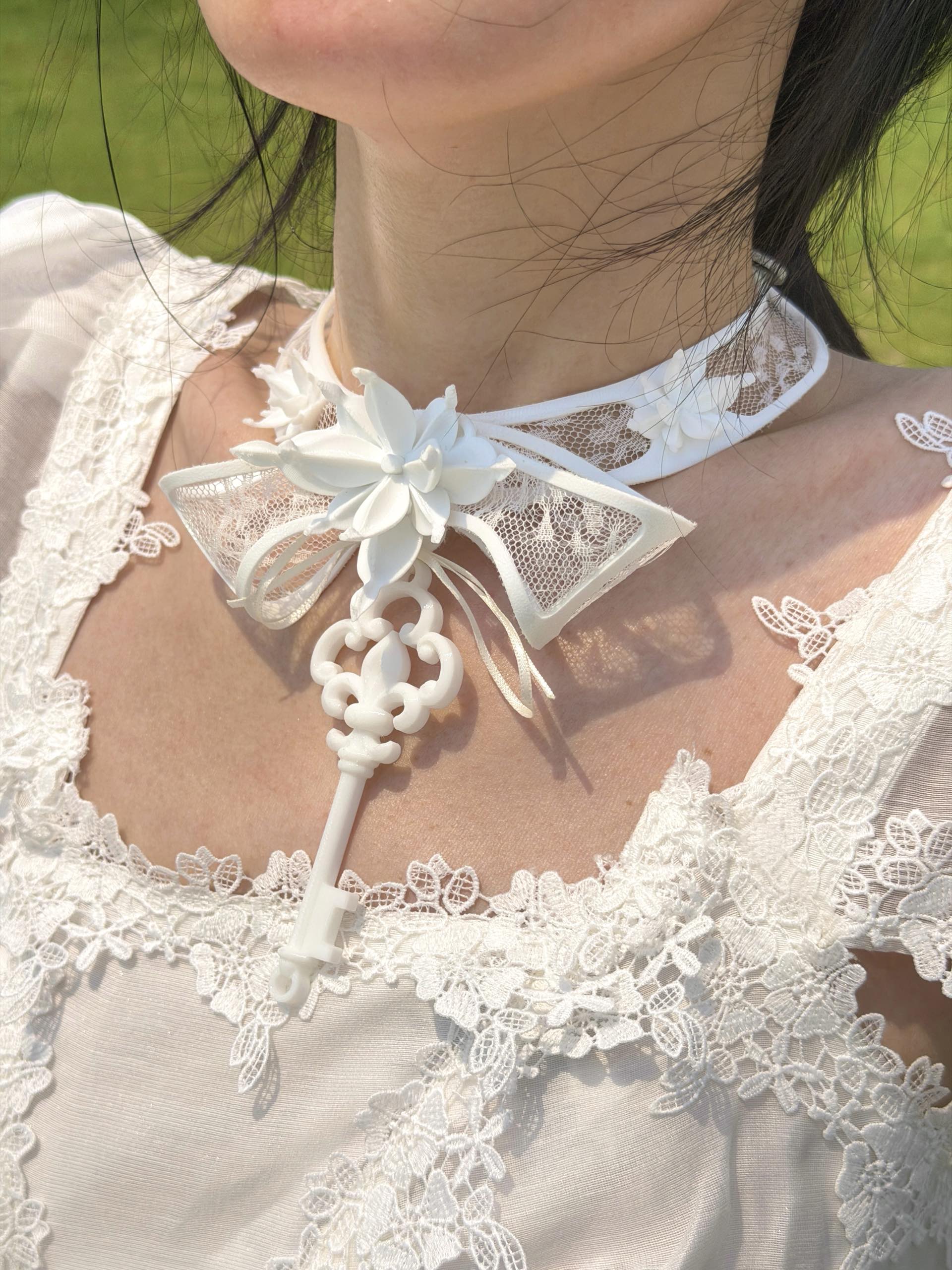 White Lace Key Choker with 3D printed flower and skeleton key pendant — worn with lace top