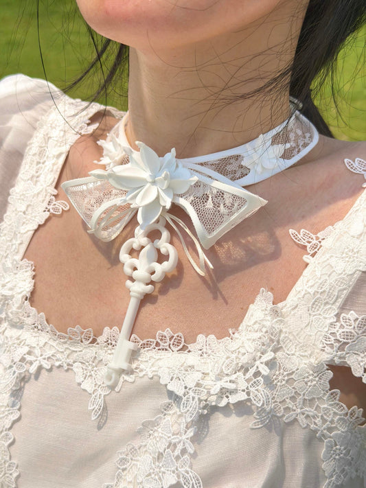 White Lace Key Choker with 3D printed flower and skeleton key pendant — worn with lace top