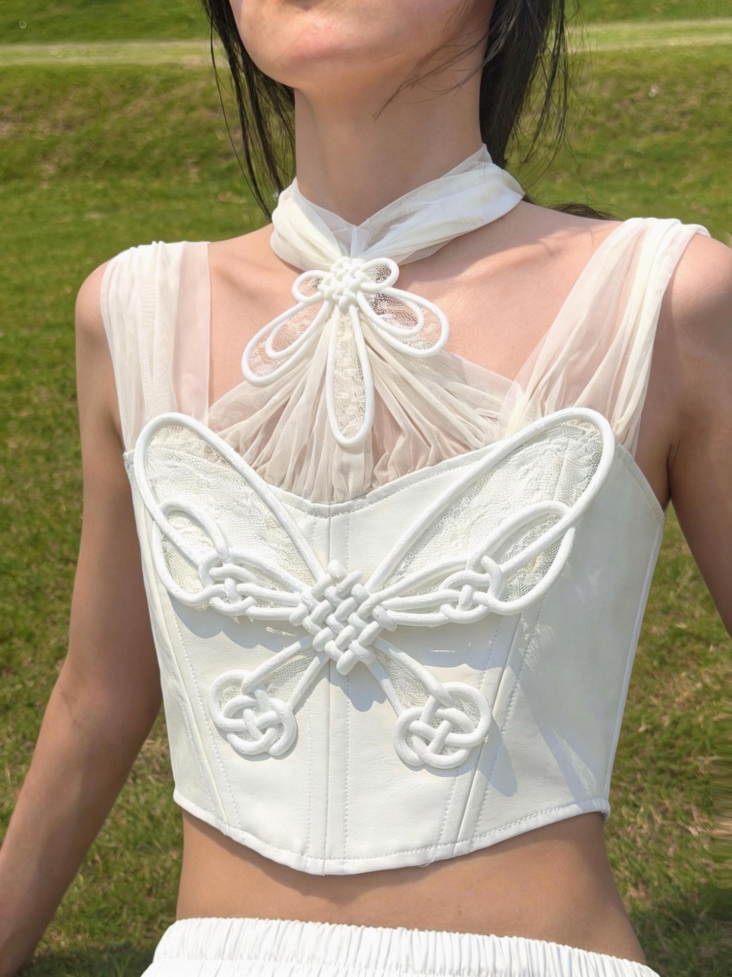 Butterfly Knot Corset in white — 3D printed endless-knot bodice close-up