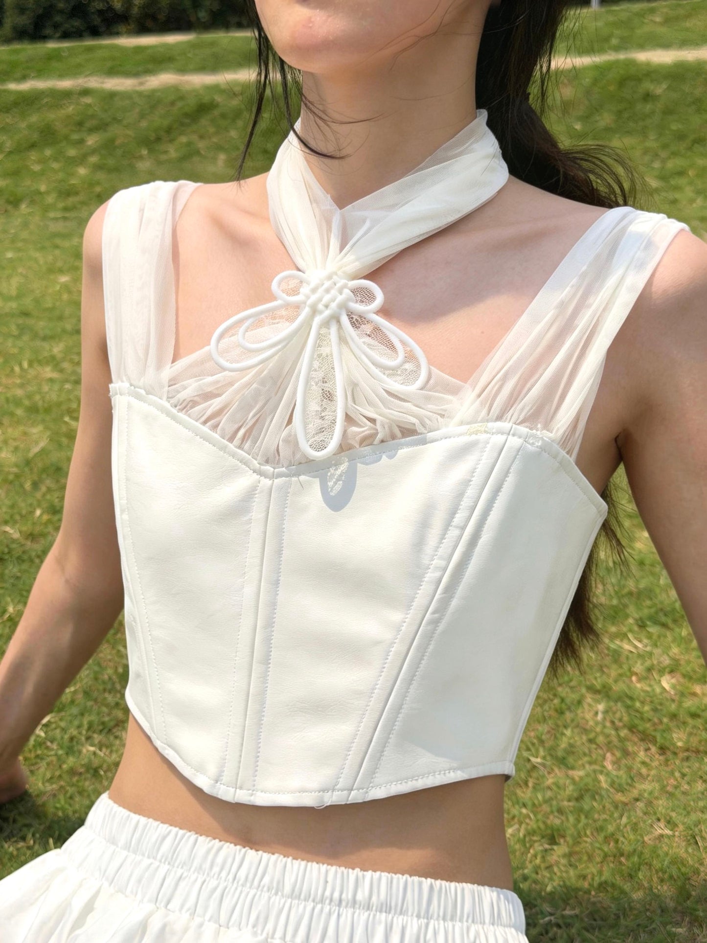 White corset top with 3D printed neck bow — clean front view